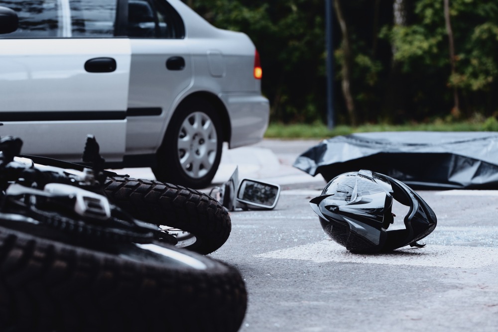 motorcycle accident with helmet on the road