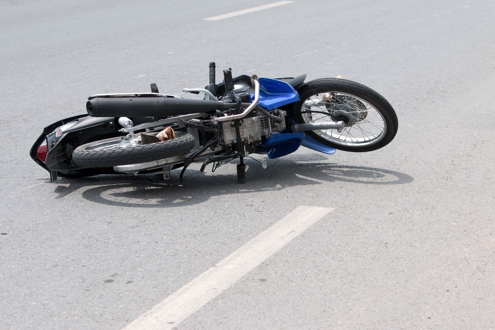 motorcycle lying in the road