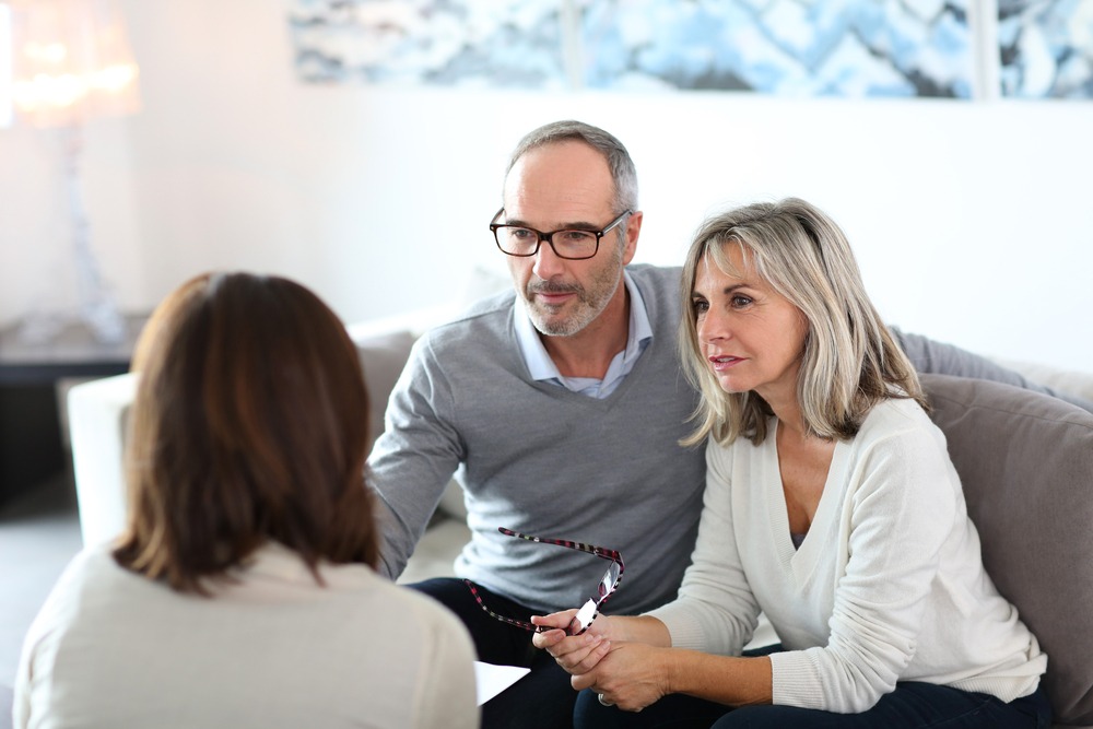 older couple sitting down for estate planning