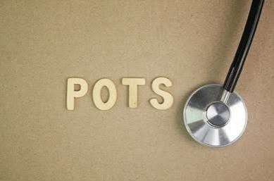 A stethoscope next to the letters “POTS.” Find out whether POTS qualifies for disability.